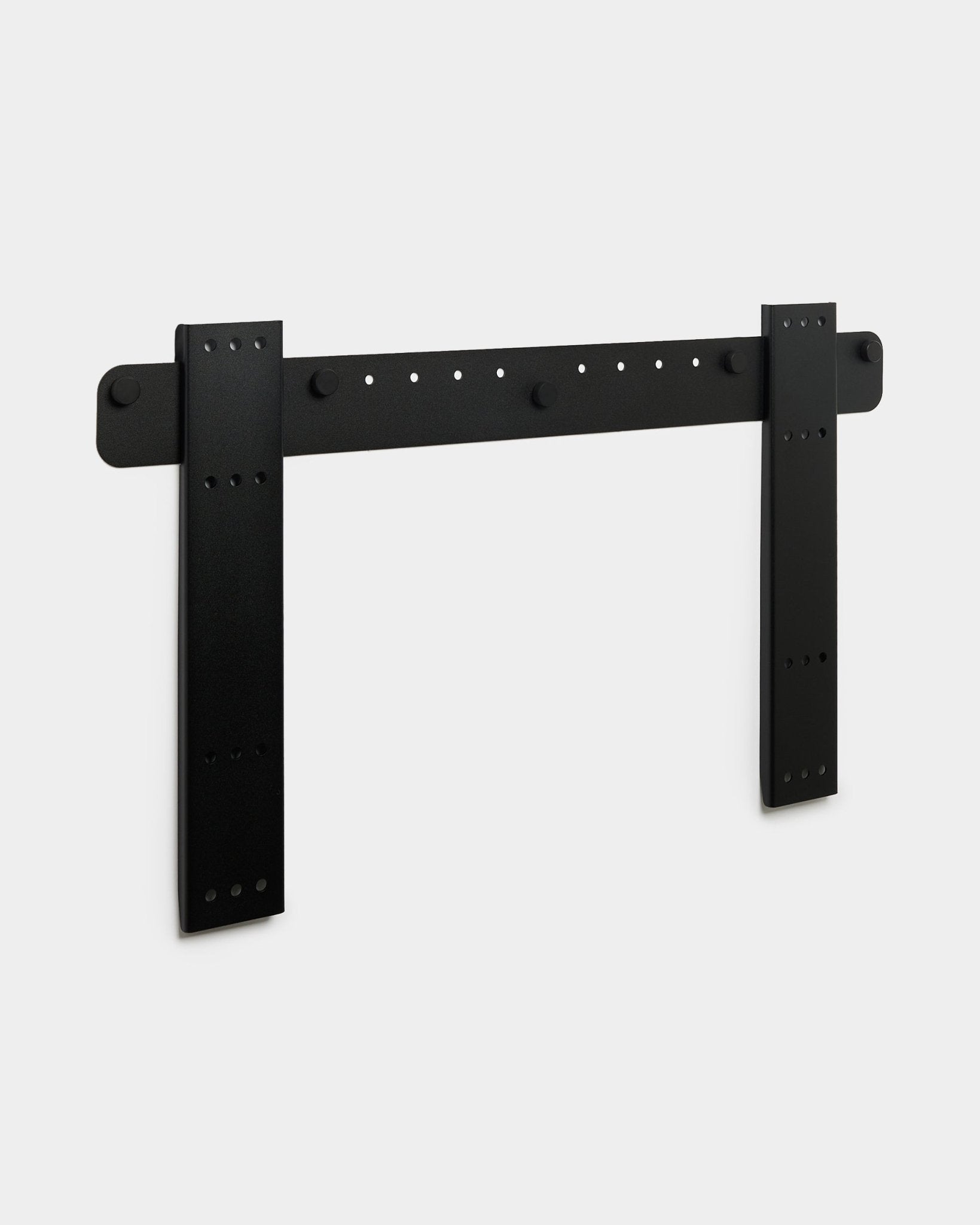 WoodUpp Fjell Large TV Mount with dual vertical supports, VESA 600x400 compatibility, black metal finish shown on a light gray background.